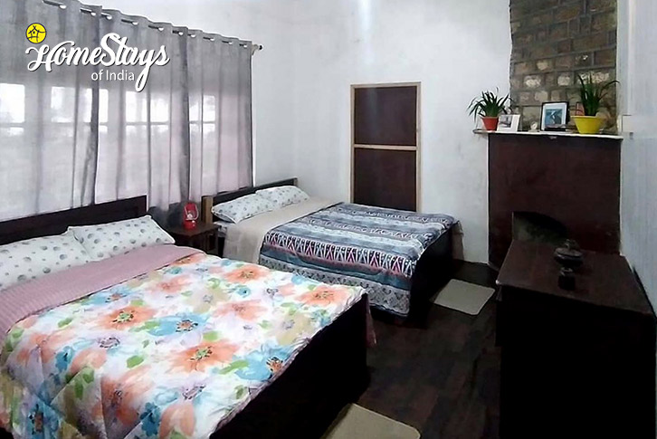Bedroom-1-Ancient Glory Heritage Homestay-Takdah