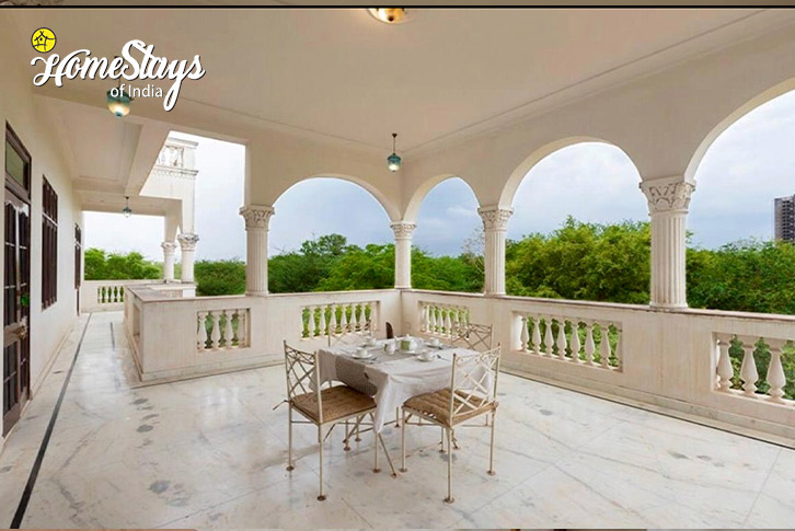 Balcony-Sitting-1-Serene Green Homestay- Jaipur