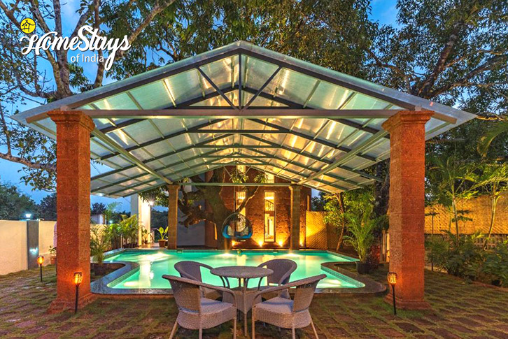 Pool-side-sitting-Elite Elegance Villa, Mandrem-North Goa